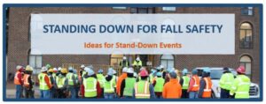 Picture of a group of construction workers wearing yellow and orange work gear gathered outside of a brick building. There is a banner that says "Standing Down for Fall Safety: Ideas for Stand-Down Events" in blue and orange text above them